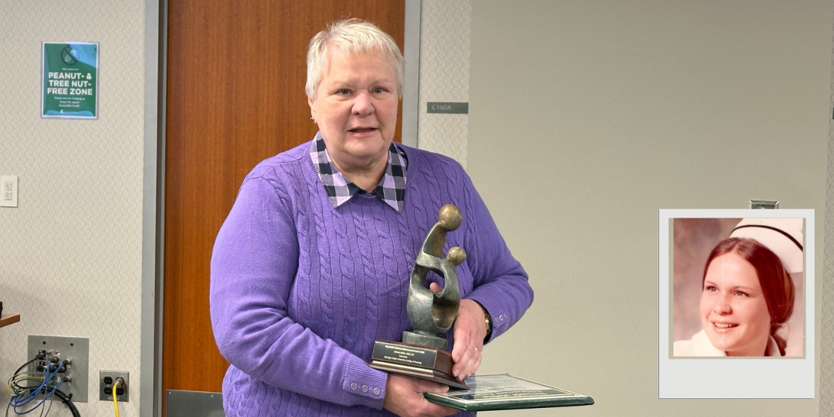 Sandy Geller holding DAISY Award.