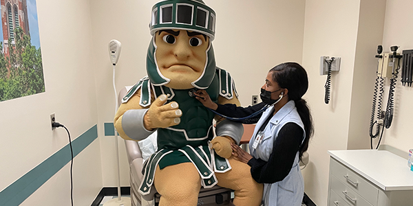Sparty being examined by a nurse practitioner.