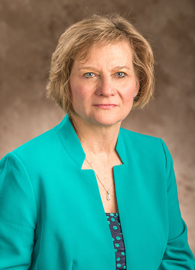 Dr. Lorraine Robbins in a suit